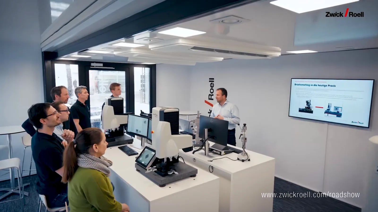 Training room in the truck, a group at measuring devices